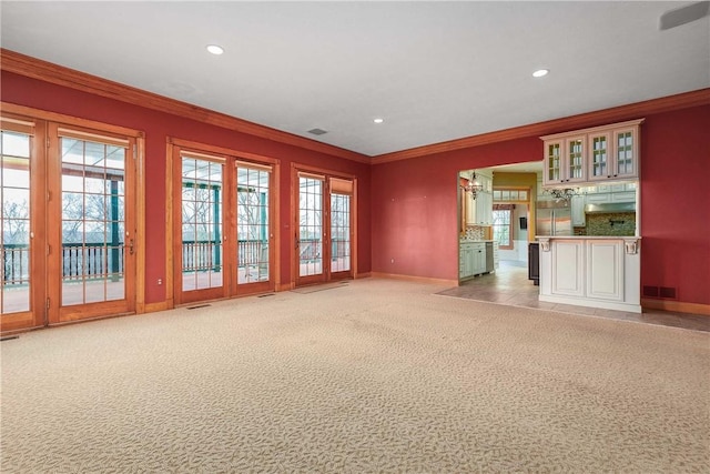 422 Heights Dr, Pine Twp Nal, PA 15044 - unfurnished living room with visible vents, baseboards, ornamental molding, recessed lighting, and light colored carpet