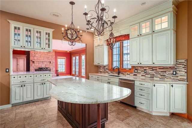422 Heights Dr, Pine Twp Nal, PA 15044 - kitchen featuring an inviting chandelier, a kitchen island, dishwasher, a sink, and backsplash