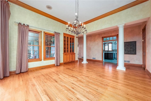 422 Heights Dr, Pine Twp Nal, PA 15044 - spare room with decorative columns, baseboards, and wood finished floors