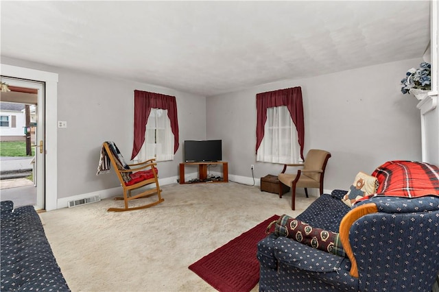 313 N Market St, Carmichaels/Cumblnd, PA 15320 - carpeted living room with visible vents and baseboards