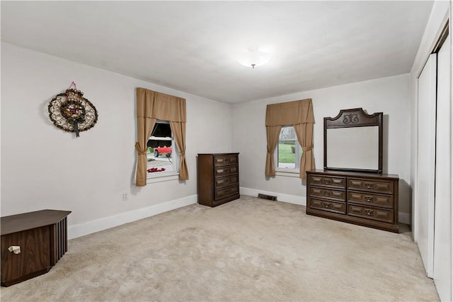 313 N Market St, Carmichaels/Cumblnd, PA 15320 - carpeted bedroom featuring a closet, baseboards, and visible vents