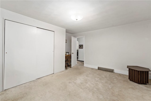313 N Market St, Carmichaels/Cumblnd, PA 15320 - unfurnished bedroom with a closet, carpet, and visible vents
