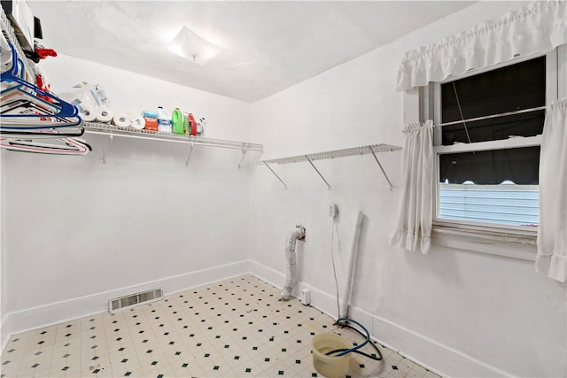 313 N Market St, Carmichaels/Cumblnd, PA 15320 - laundry room featuring visible vents, tile patterned floors, laundry area, and baseboards