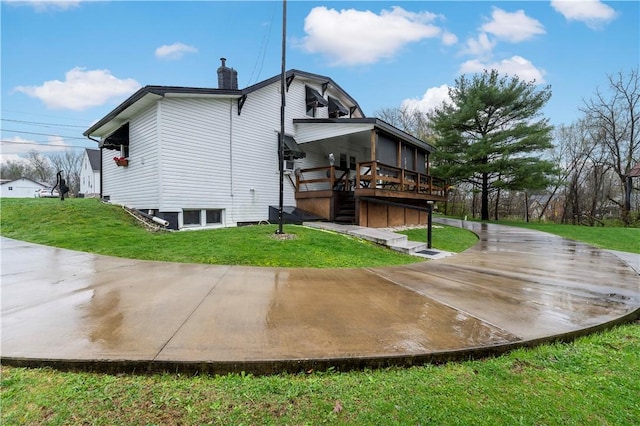 313 N Market St, Carmichaels/Cumblnd, PA 15320 - back of house with stairway, a deck, a chimney, and a lawn
