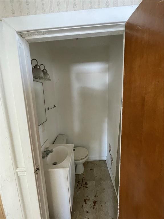 846 Florence Ave, East Mckeesport, PA 15035 - half bathroom featuring toilet and vanity