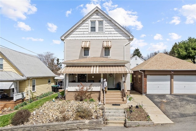 16 Elm St, Burgettstown Boro, PA 15021 - american foursquare style home with a garage, a porch, and an outdoor structure