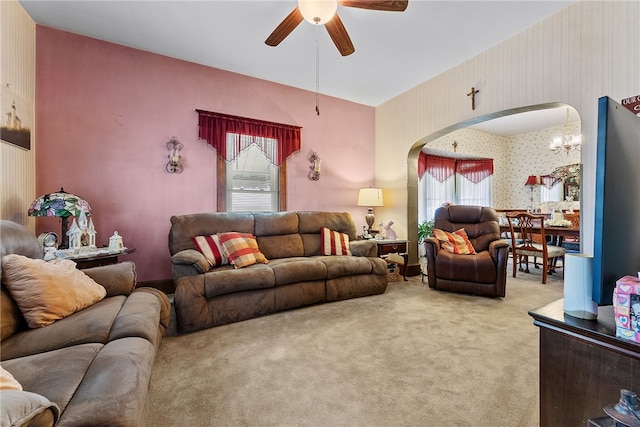 16 Elm St, Burgettstown Boro, PA 15021 - living area with light carpet, arched walkways, a ceiling fan, and wallpapered walls