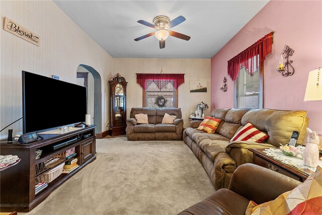 16 Elm St, Burgettstown Boro, PA 15021 - carpeted living room with arched walkways, a healthy amount of sunlight, and a ceiling fan