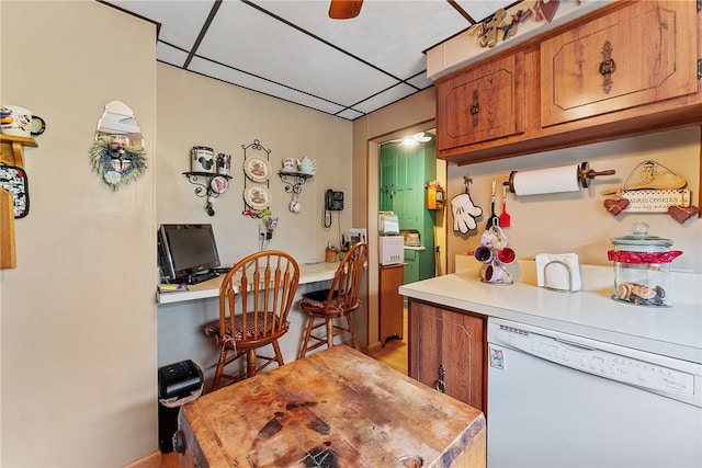 16 Elm St, Burgettstown Boro, PA 15021 - kitchen featuring white dishwasher, a paneled ceiling, brown cabinets, and light countertops