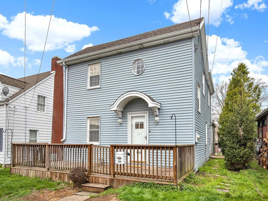 329 Margaret St, Jeannette, PA 15644 - back of house featuring a wooden deck