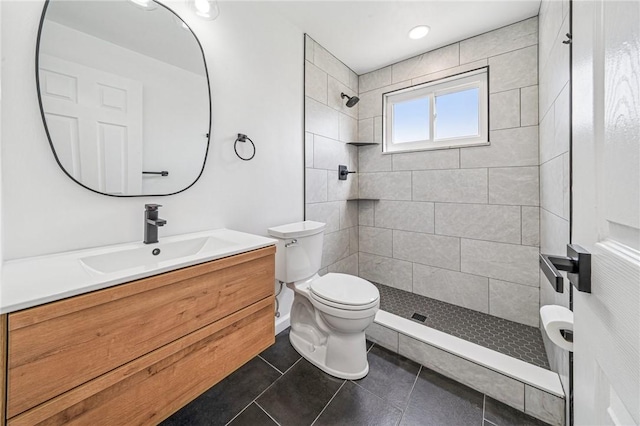 226 Old Leechburg Rd, Plum Boro, PA 15239 - bathroom featuring tile patterned floors, toilet, tiled shower, and vanity