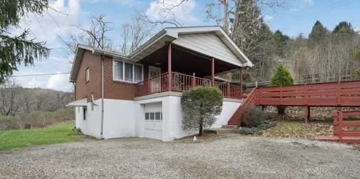 3053 Trafford Rd, Murrysville, PA 15668 - back of house featuring a garage