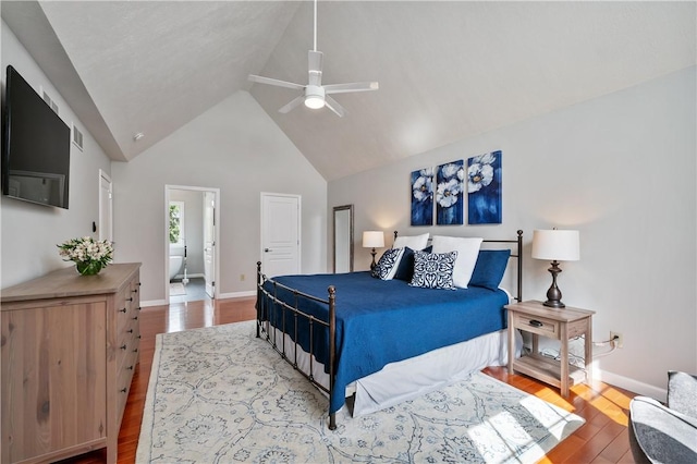 bedroom with visible vents, baseboards, hardwood / wood-style floors, and ceiling fan