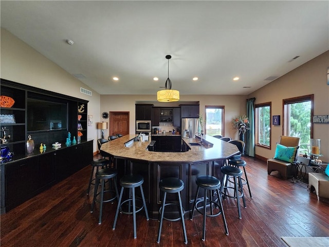 288 Latonka Dr, Jackson Twp Mer, PA 16137 - kitchen featuring appliances with stainless steel finishes, dark wood-type flooring, recessed lighting, a large island, and lofted ceiling