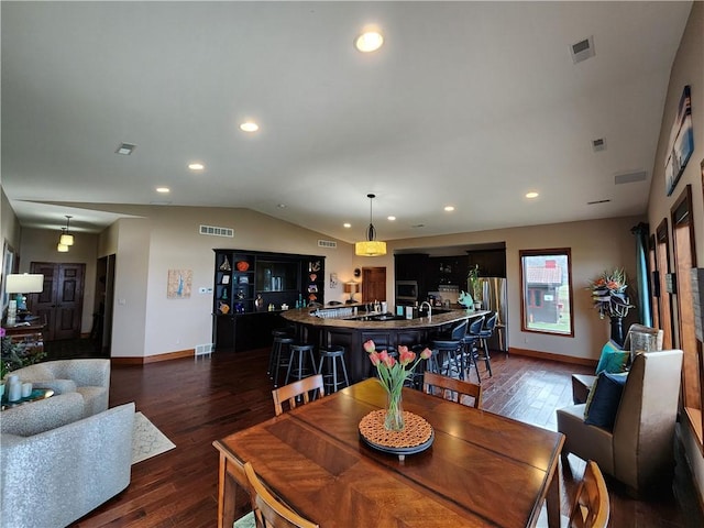 288 Latonka Dr, Jackson Twp Mer, PA 16137 - dining room featuring dark wood finished floors, baseboards, recessed lighting, and lofted ceiling