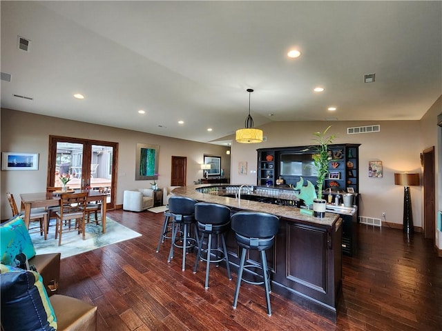 288 Latonka Dr, Jackson Twp Mer, PA 16137 - kitchen with open floor plan, dark wood-type flooring, light stone counters, a large island, and recessed lighting