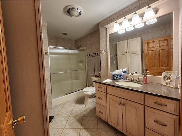 288 Latonka Dr, Jackson Twp Mer, PA 16137 - bathroom with a shower stall, vanity, toilet, and tile patterned floors
