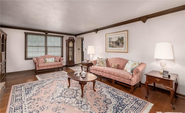 living room featuring crown molding, baseboards, and hardwood / wood-style flooring
