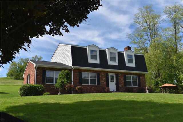 511 Pleasant Valley Rd, Buffalo Twp Wsh, PA 15301 - view of front of property with brick siding, a front yard, a chimney, and a gazebo