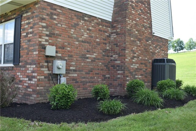 511 Pleasant Valley Rd, Buffalo Twp Wsh, PA 15301 - view of side of home featuring cooling unit and a chimney
