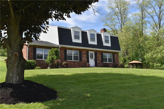 511 Pleasant Valley Rd, Buffalo Twp Wsh, PA 15301 - view of front of home featuring a front lawn, a gazebo, brick siding, and a chimney