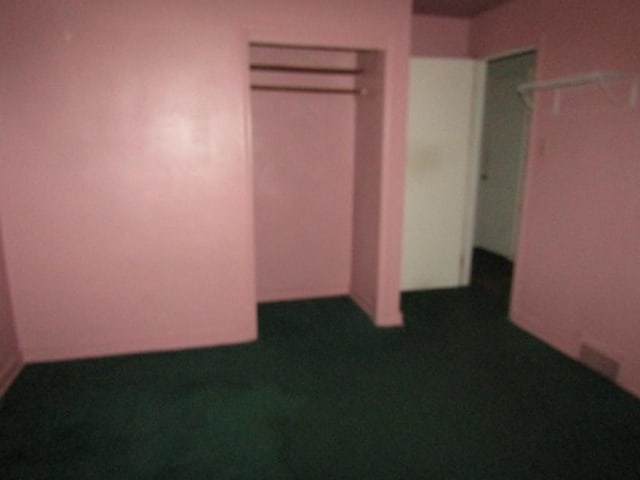 unfurnished bedroom featuring a closet