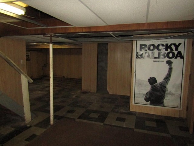 finished basement with wooden walls