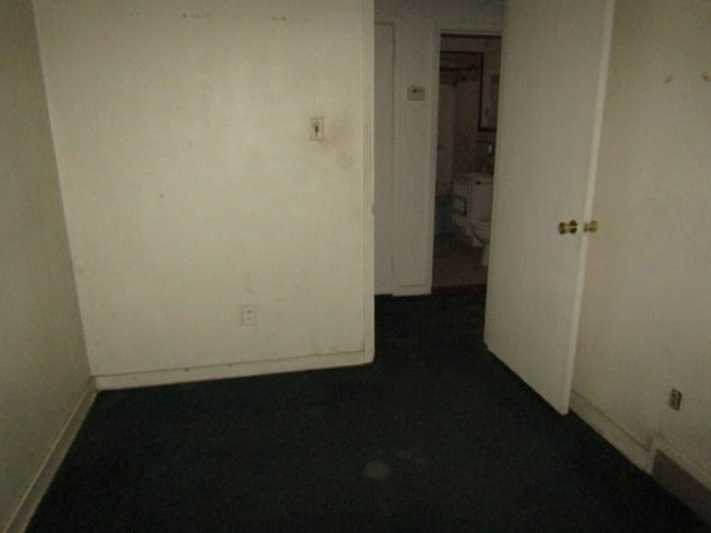 empty room with baseboards