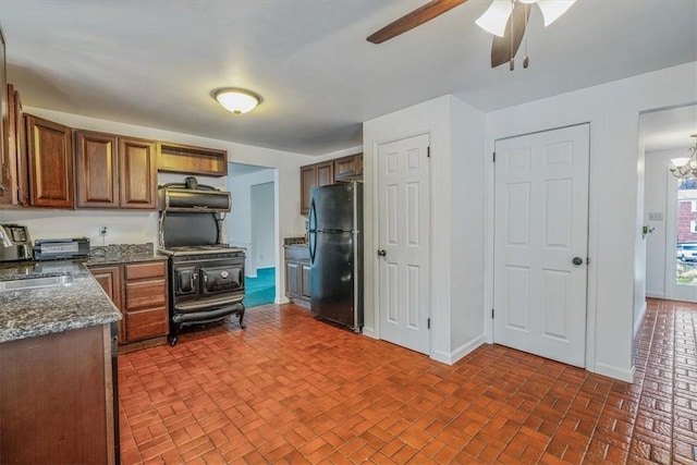 112 Carol Dr, Peters Twp, PA 15317 - kitchen featuring freestanding refrigerator, brick patterned flooring, a ceiling fan, and open shelves