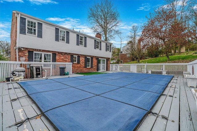 112 Carol Dr, Peters Twp, PA 15317 - view of pool with a grill and a wooden deck