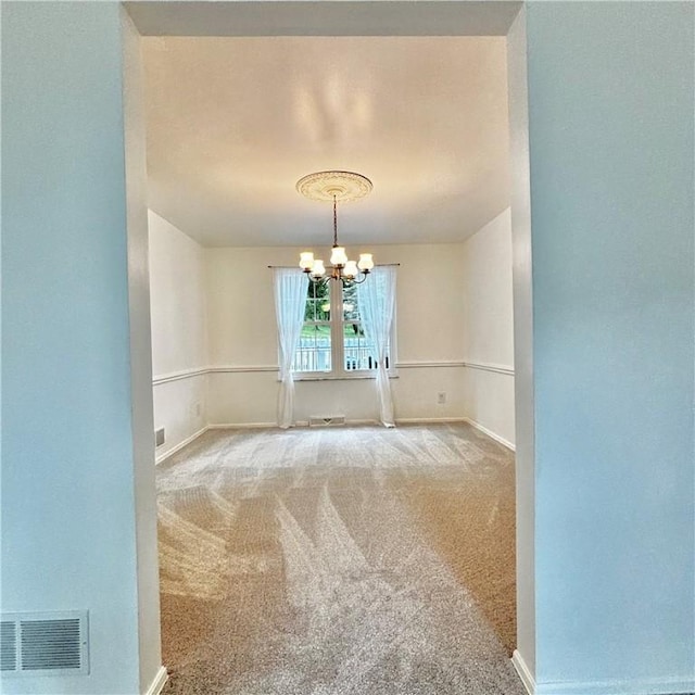 112 Carol Dr, Peters Twp, PA 15317 - carpeted spare room with a chandelier and baseboards