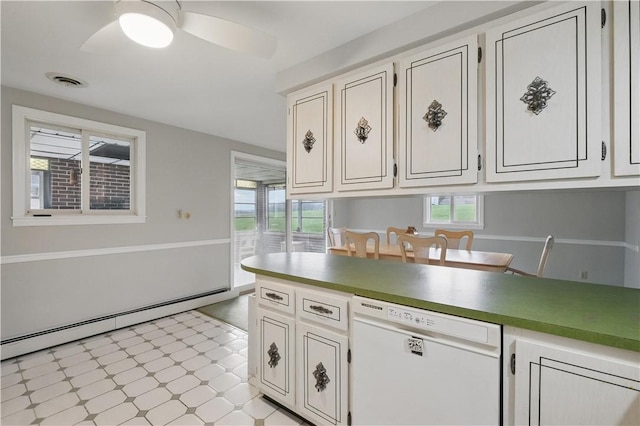 kitchen with a wealth of natural light, dishwasher, a baseboard radiator, and light floors