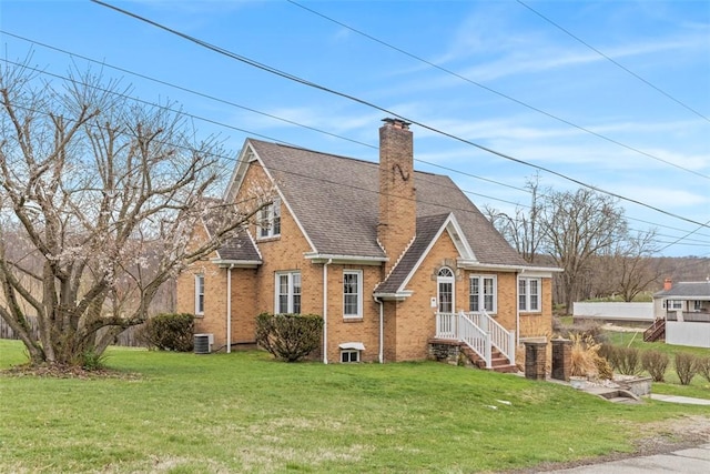 40 Terrace Rd, East Bethlehem, PA 15348 - view of front of property featuring a shingled roof, a chimney, cooling unit, brick siding, and a front lawn