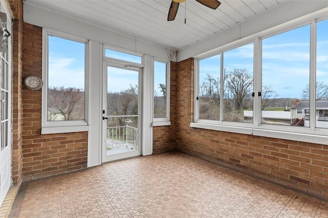 40 Terrace Rd, East Bethlehem, PA 15348 - unfurnished sunroom featuring tile patterned floors and brick wall