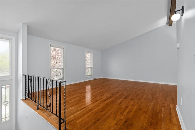 137 Loire Valley Dr, Shaler, PA 15209 - empty room with baseboards, wood finished floors, and lofted ceiling
