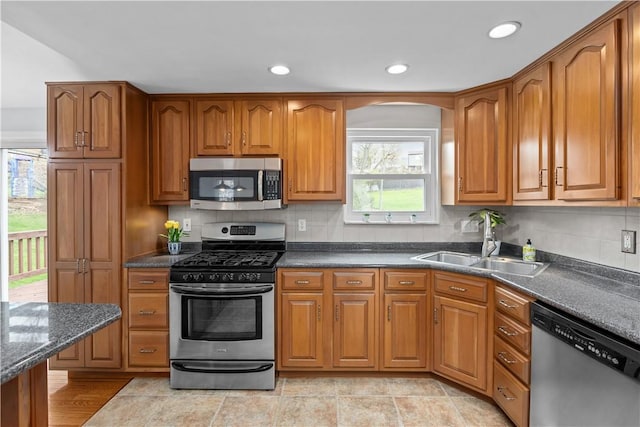 137 Loire Valley Dr, Shaler, PA 15209 - kitchen with brown cabinets, a sink, and appliances with stainless steel finishes