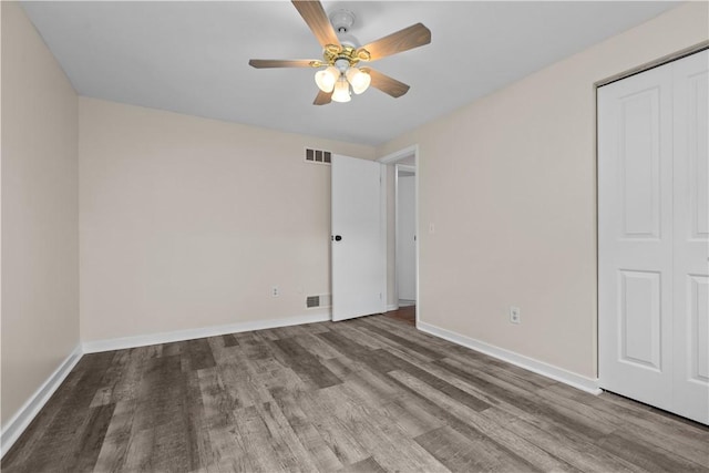 137 Loire Valley Dr, Shaler, PA 15209 - unfurnished bedroom featuring visible vents, baseboards, a closet, and wood finished floors