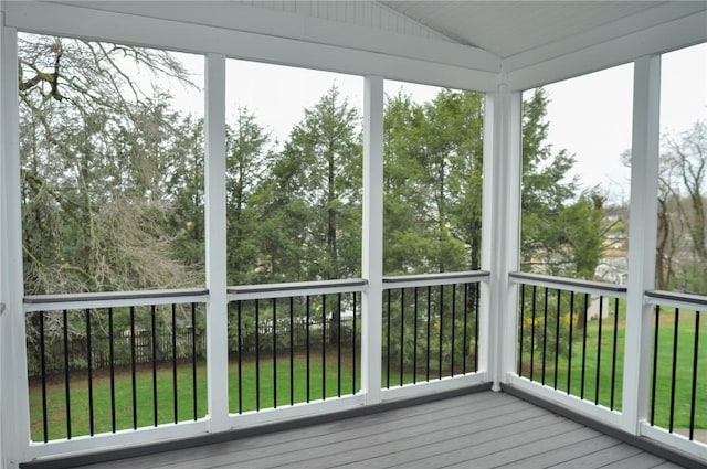 unfurnished sunroom with plenty of natural light