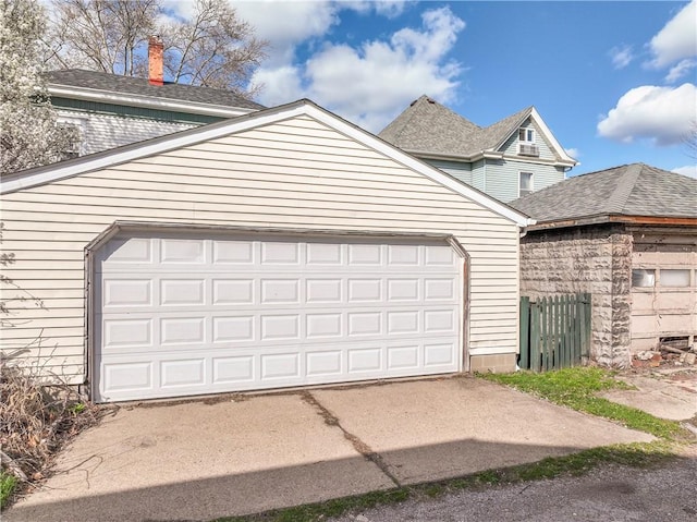 garage featuring driveway