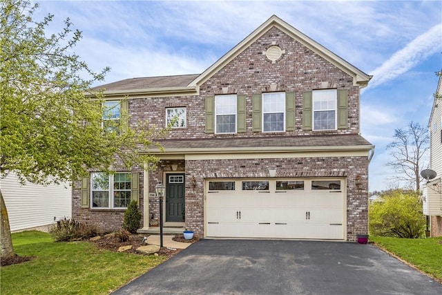 114 Village Cir, North Fayette, PA 15071 - traditional-style house with asphalt driveway, an attached garage, brick siding, and a front yard
