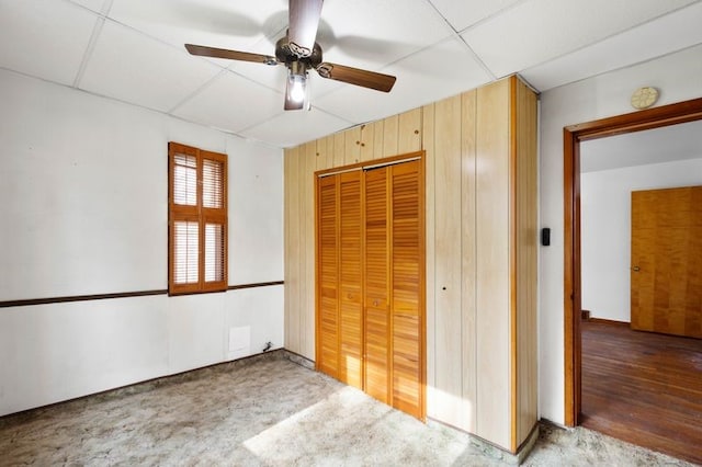 3555 Middleboro Rd, Castle Shannon, PA 15234 - unfurnished bedroom featuring a closet, a ceiling fan, a drop ceiling, and carpet flooring