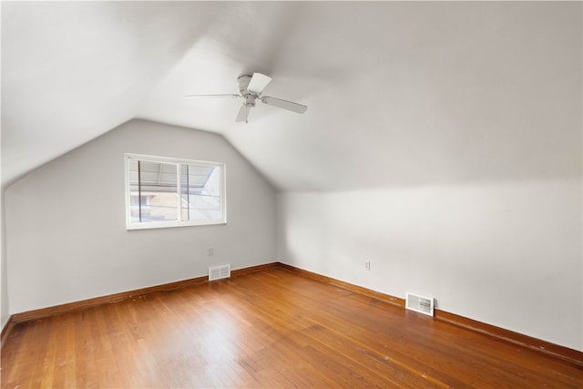 3555 Middleboro Rd, Castle Shannon, PA 15234 - additional living space with wood finished floors, baseboards, vaulted ceiling, and visible vents