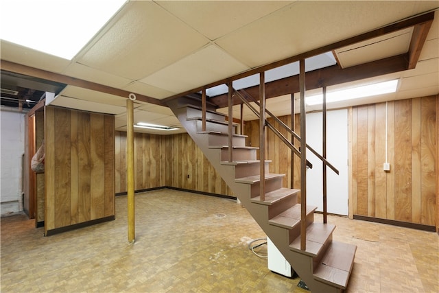 3555 Middleboro Rd, Castle Shannon, PA 15234 - finished below grade area with wooden walls, tile patterned floors, and stairway