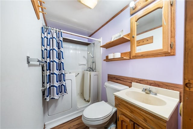 2814 W Crawford Ave, Connellsville, PA 15425 - full bath featuring toilet, wood finished floors, a shower with curtain, and vanity