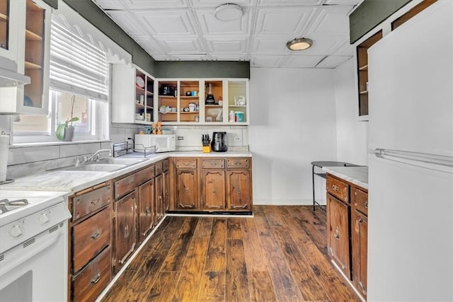 329 Downing St, Polish Hill, PA 15219 - kitchen with white appliances, dark wood-type flooring, brown cabinetry, open shelves, and light countertops
