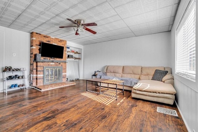 329 Downing St, Polish Hill, PA 15219 - living room with visible vents, a ceiling fan, hardwood / wood-style floors, and a fireplace