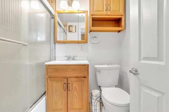 329 Downing St, Polish Hill, PA 15219 - full bathroom featuring combined bath / shower with glass door, vanity, and toilet