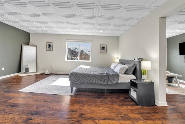 329 Downing St, Polish Hill, PA 15219 - bedroom with an ornate ceiling, baseboards, and wood finished floors