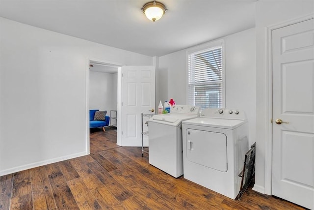 329 Downing St, Polish Hill, PA 15219 - laundry room featuring independent washer and dryer, dark wood-type flooring, laundry area, and baseboards