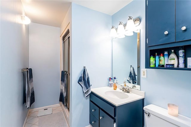 225 Circle Dr, White Oak, PA 15131 - bathroom featuring baseboards, toilet, a shower stall, vanity, and tile patterned flooring